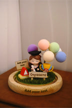 Crystal ball with sister graduate miniature in round glass dome for graduation celebration